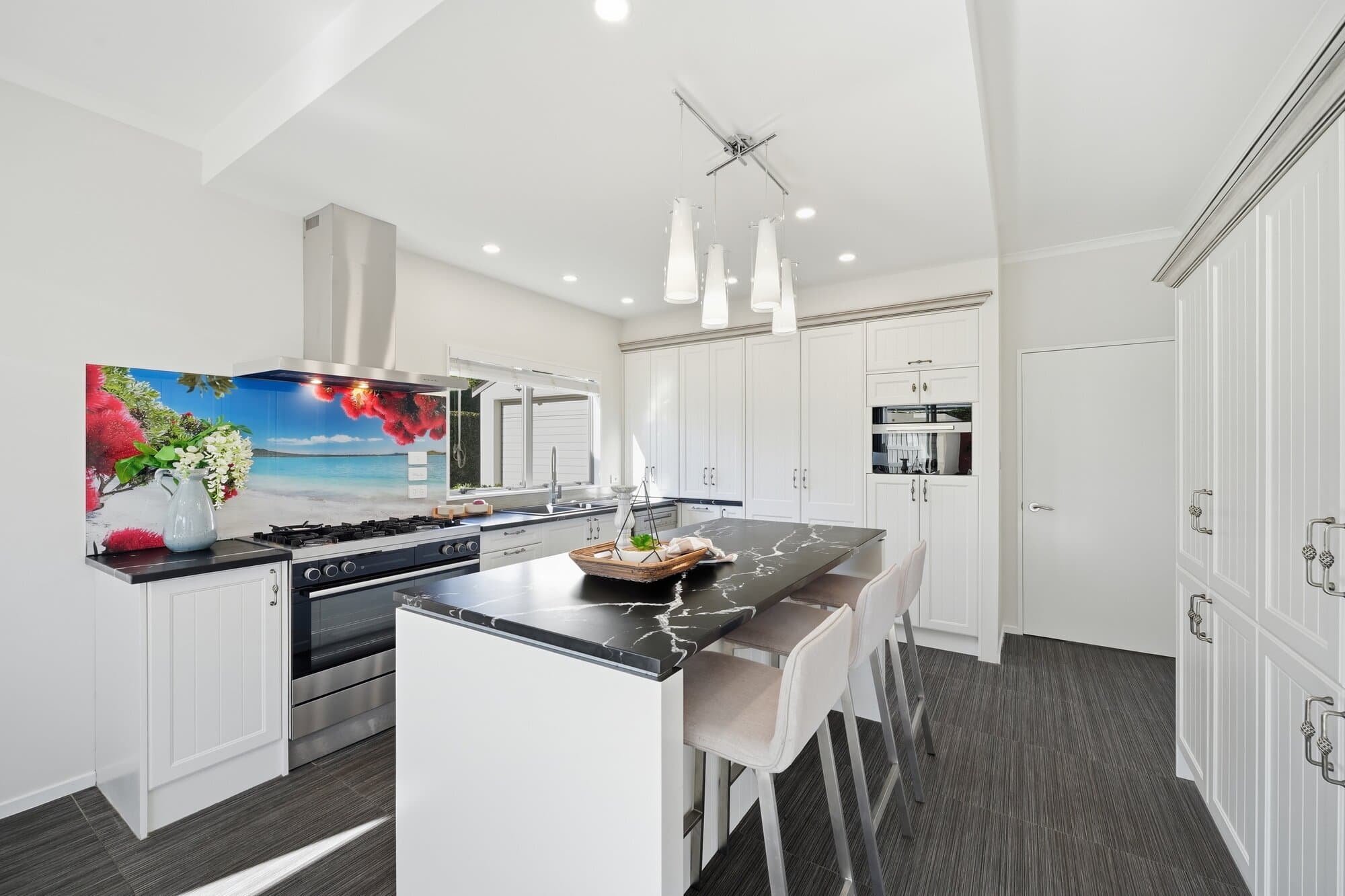 Kitchen with colourful abstract art