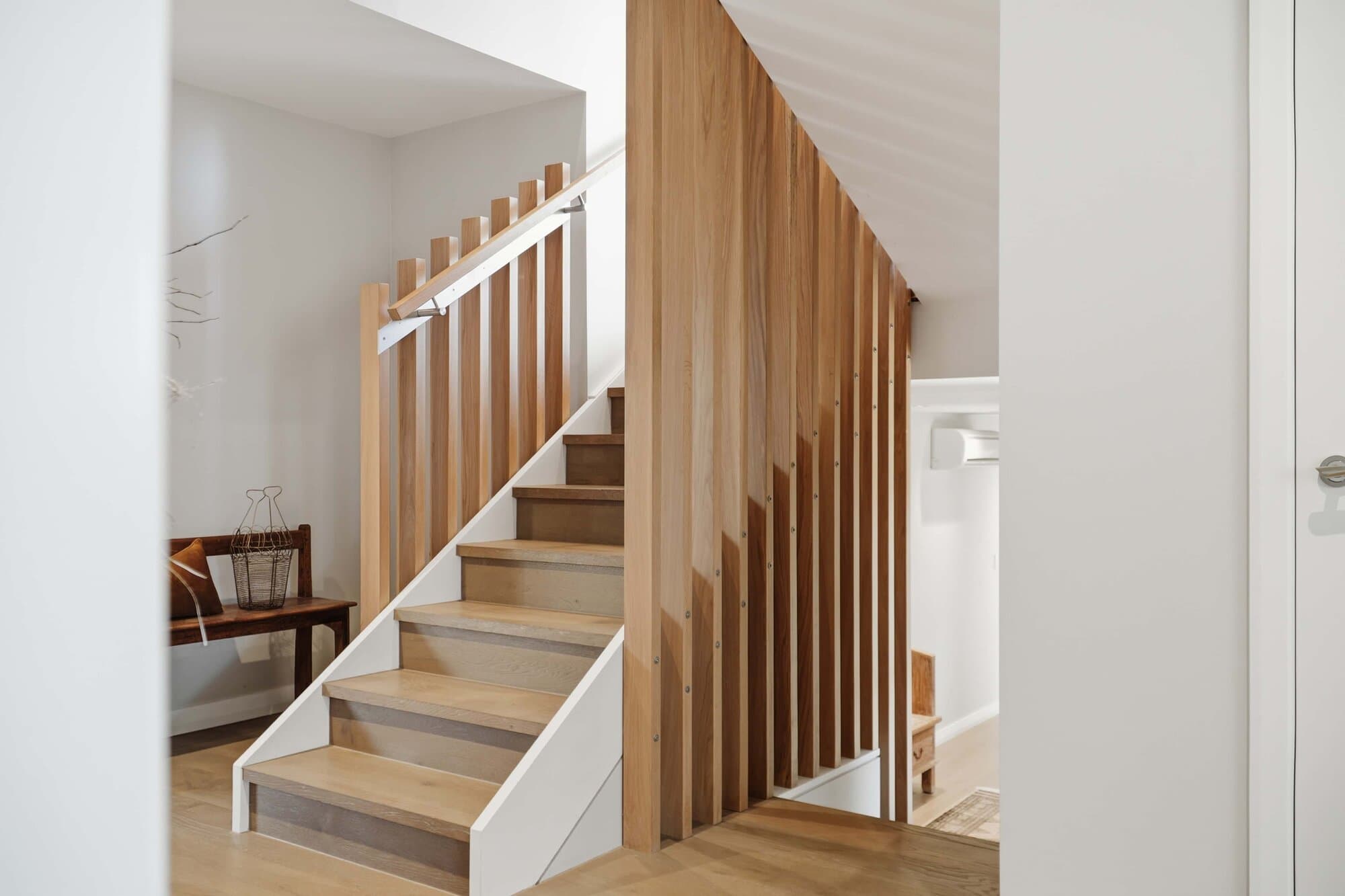 Timber staircase with a slatted balustrade