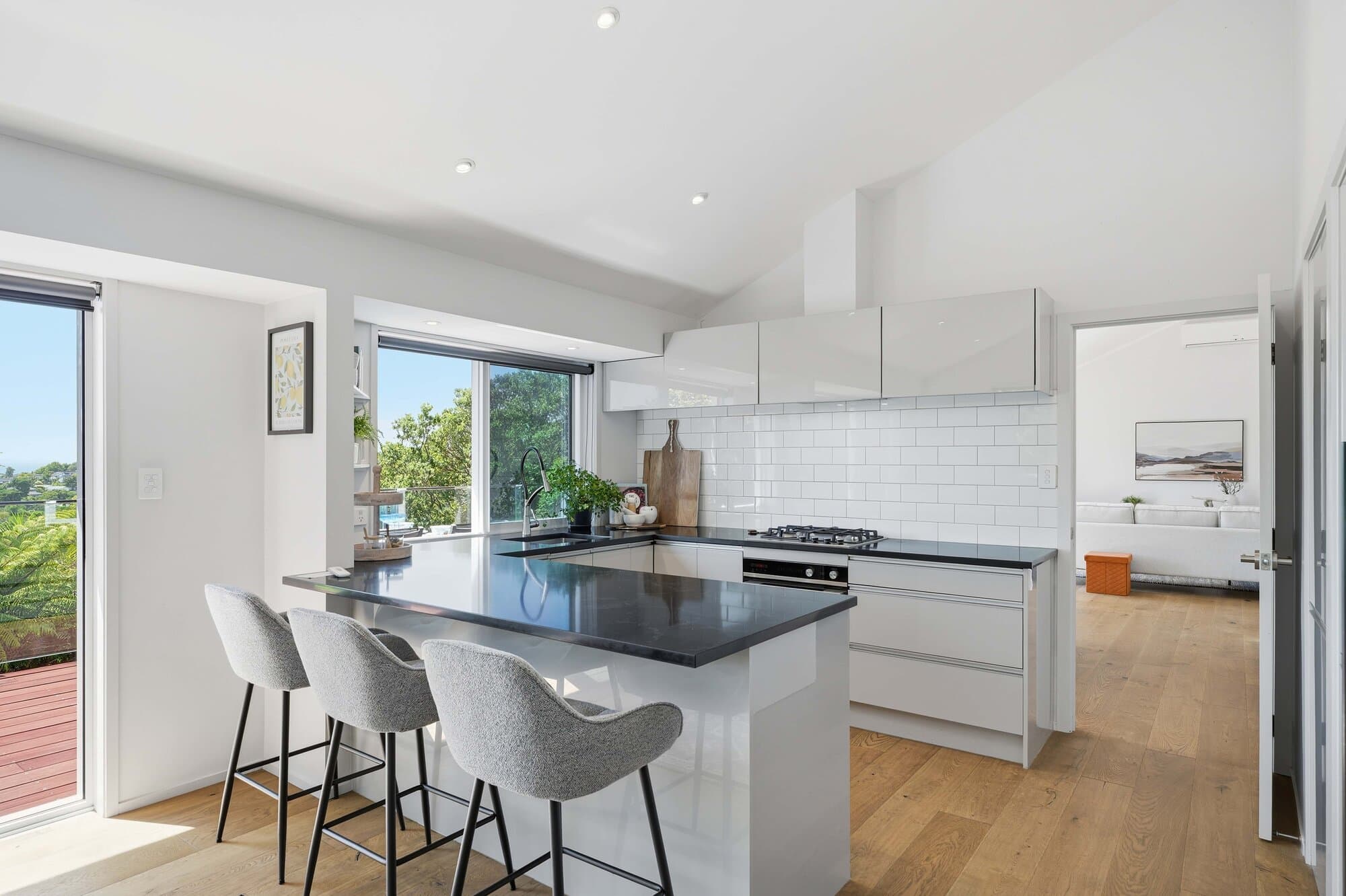 Kitchen with black tapware