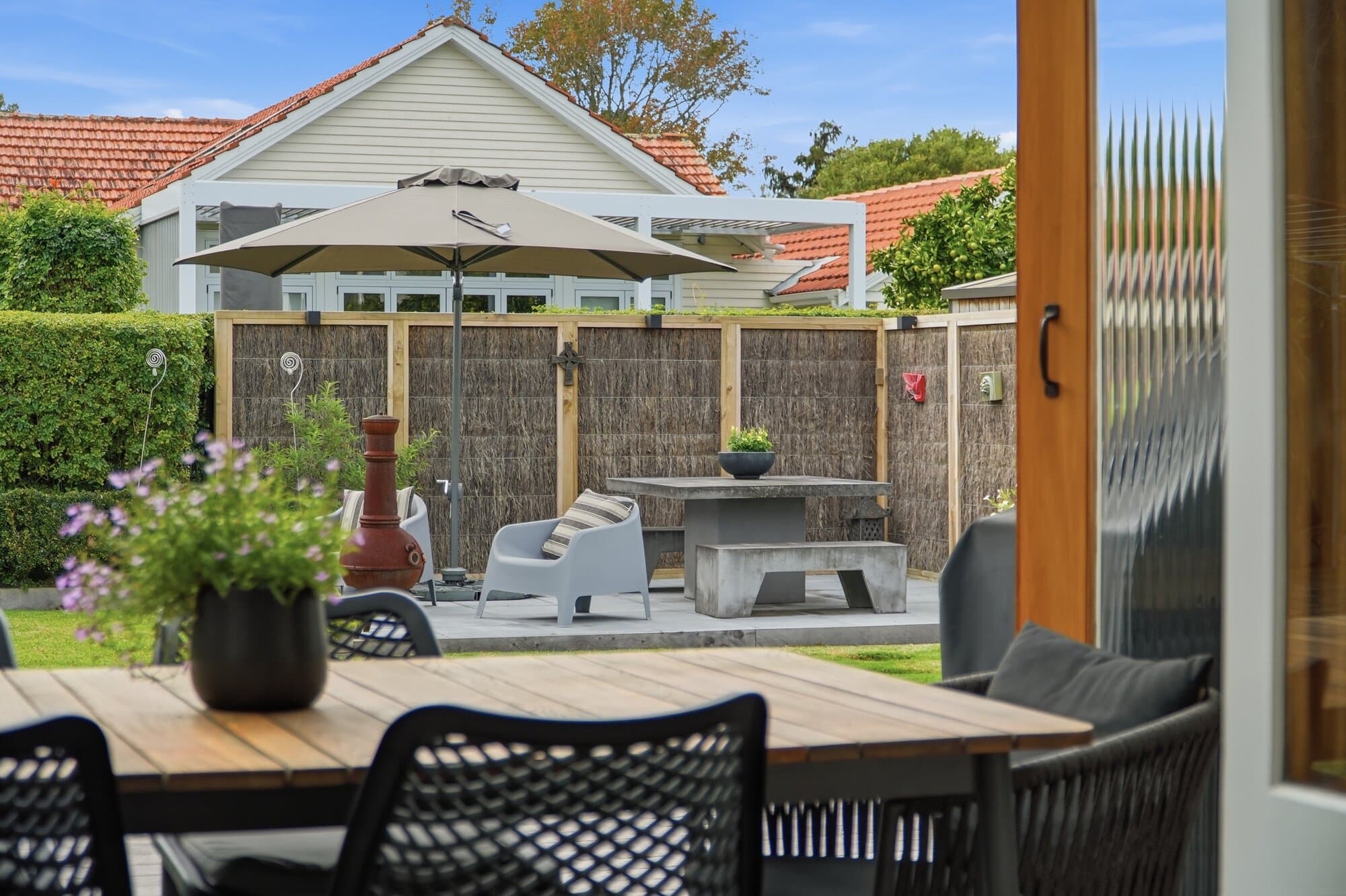 Outdoor pergola with dining setting