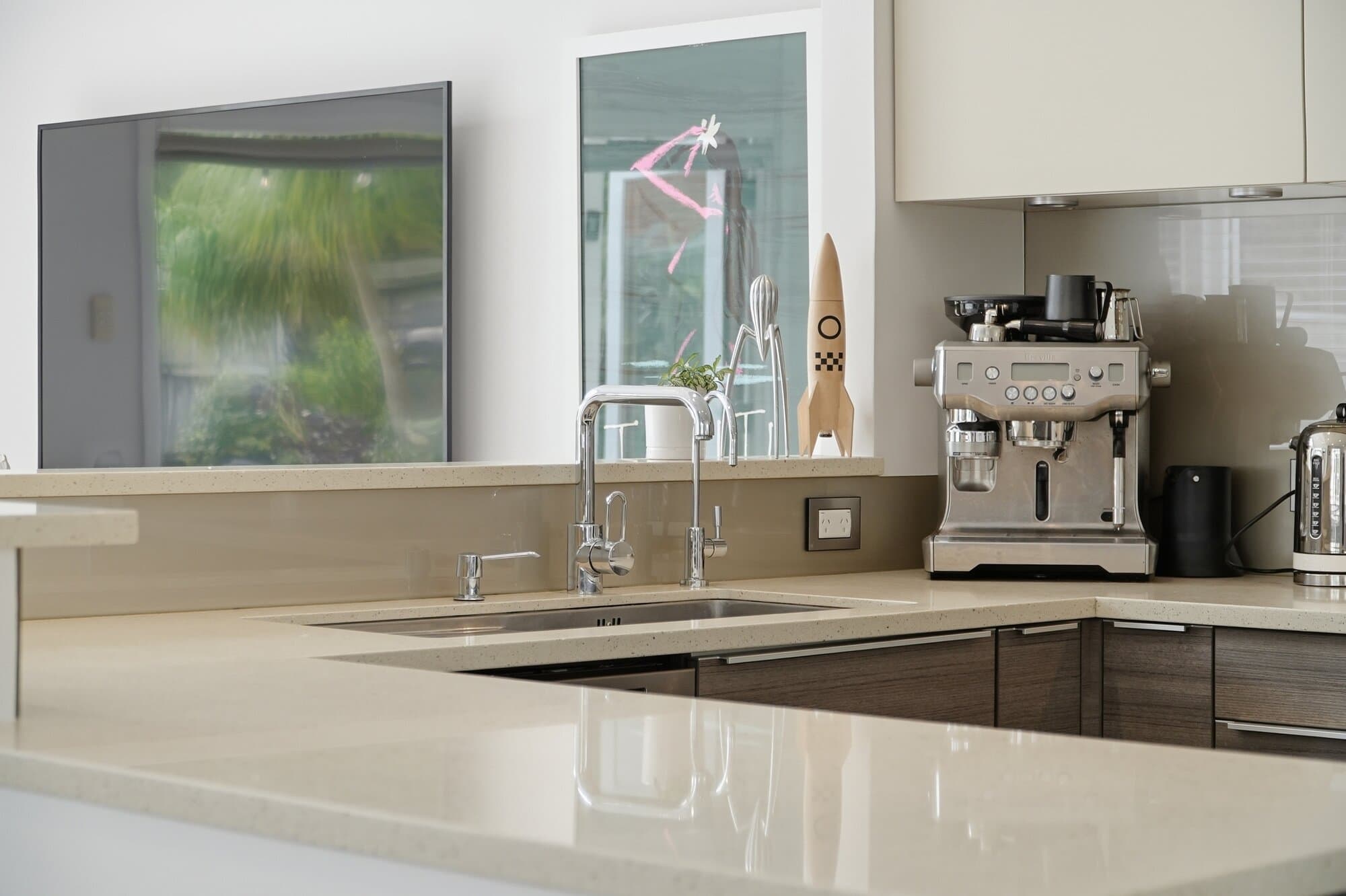 Kitchen counter with an espresso machine